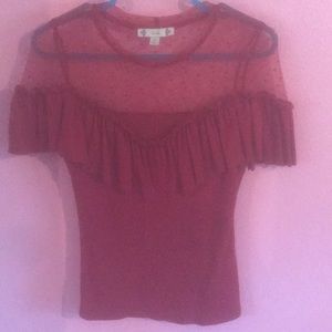 Red ruffled blouse